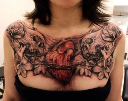Grey Ink 3D Skulls And Human Heart Tattoo On Man Chest