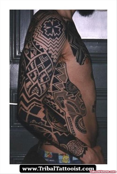 African Tattoo On Sleeve And Side Rib