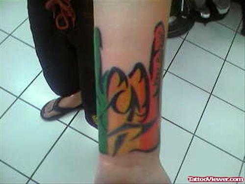 Colored African Tattoo On Wrist