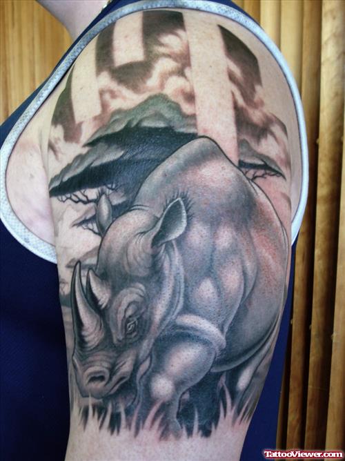 Grey ink Rhino African Tattoo On Left Half Sleeve