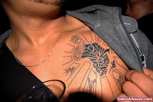 showing African Map Tattoo On Chest