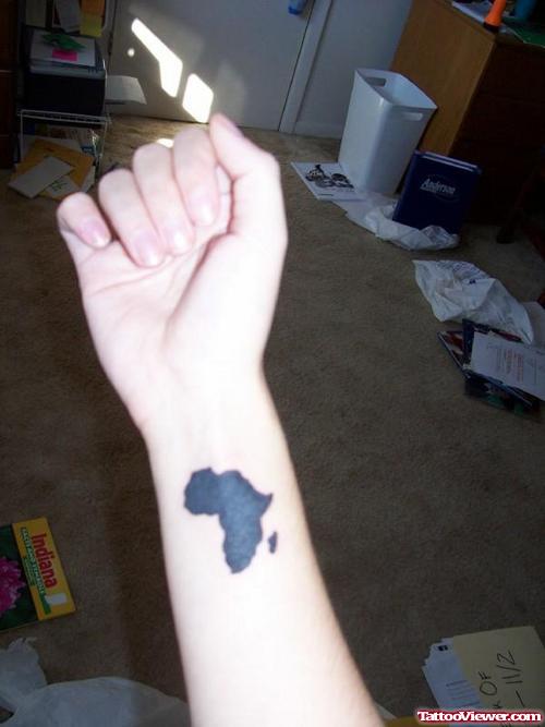 Small Black Ink African Map Tattoo On Wrist
