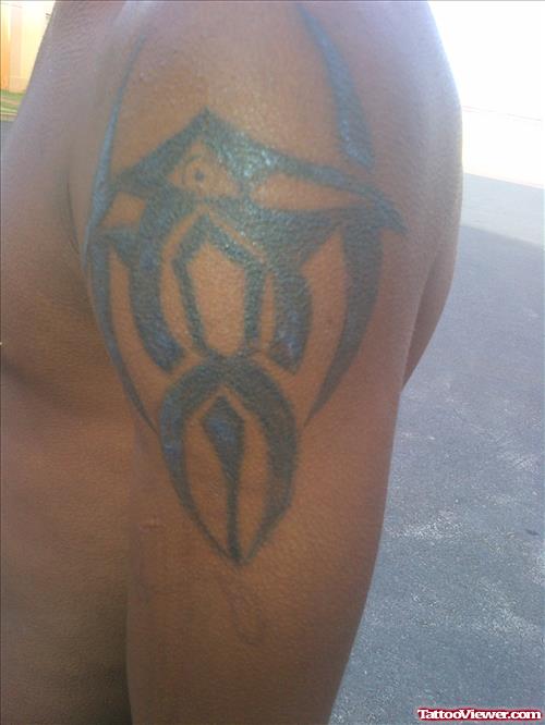 African Tattoo On Man Left Half Sleeve