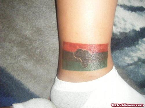 African Flag and Map Tattoo On Ankle