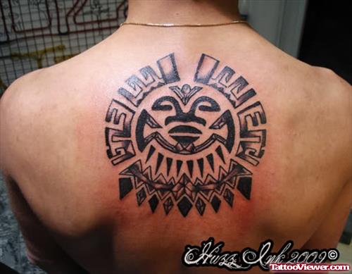 Awesome Grey Ink African Tattoo On Upperback