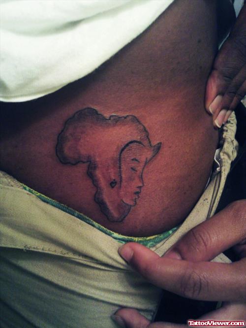 African Woman Face Tattoo On Waist