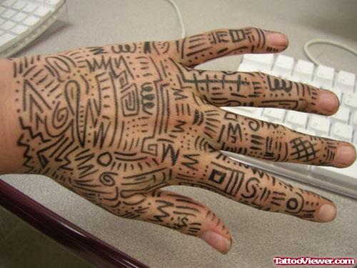 African Tribalk Tattoo On Left Hand