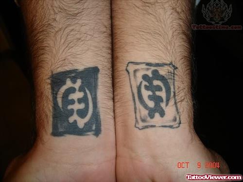 African Symbol Tattoos on Wrist