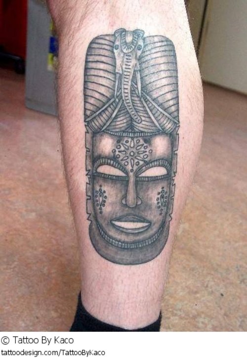 African Mask Tattoo On Leg