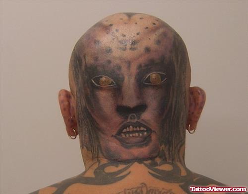 Alien Face Tattoo On Man Back Head