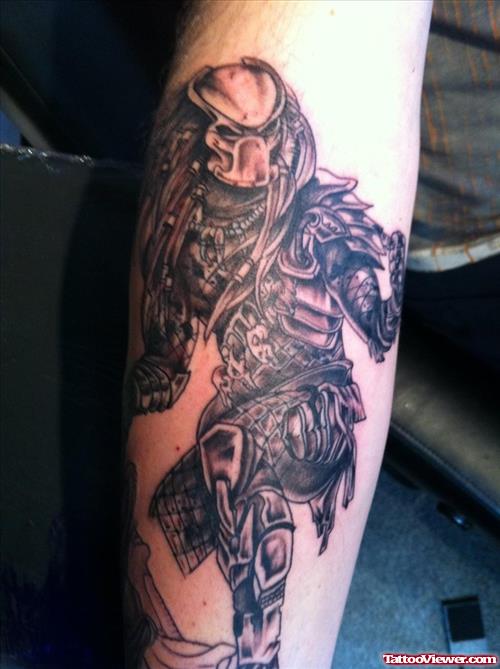 Grey Ink Predator Tattoo On Arm