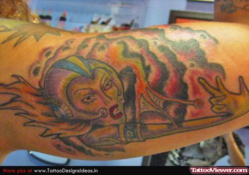 Color Ink Female Alien Tattoo On Biceps