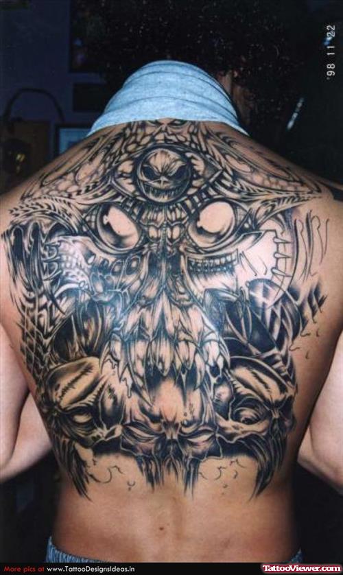 Biomechanical Grey Ink Alien Tattoo On Back