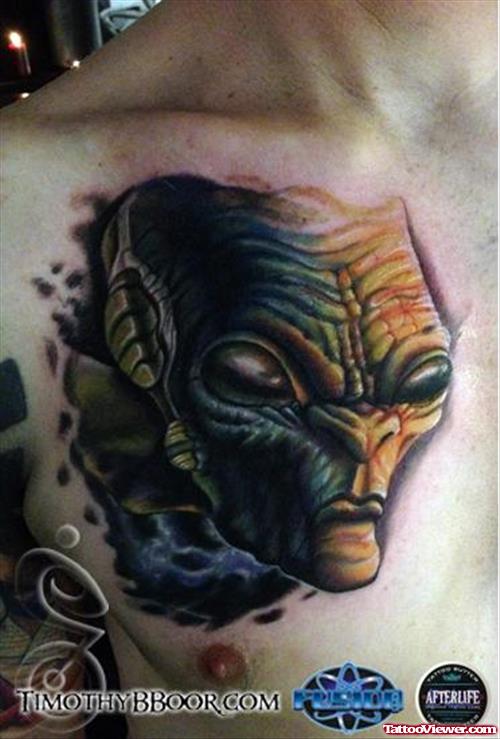 Alien Head Tattoo On Man Chest