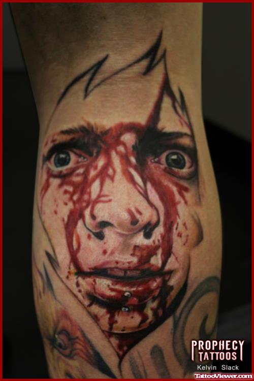Injured Alien Face Tattoo