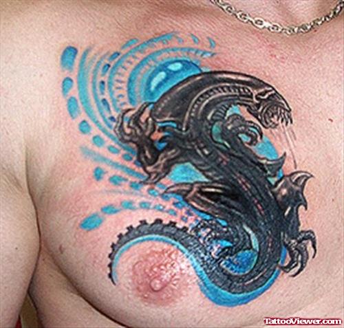 Grey Ink Alien Tattoo On Man Chest