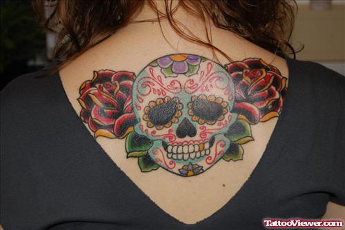 Red Roses And Alien Skull Tattoo On Girl Upperback