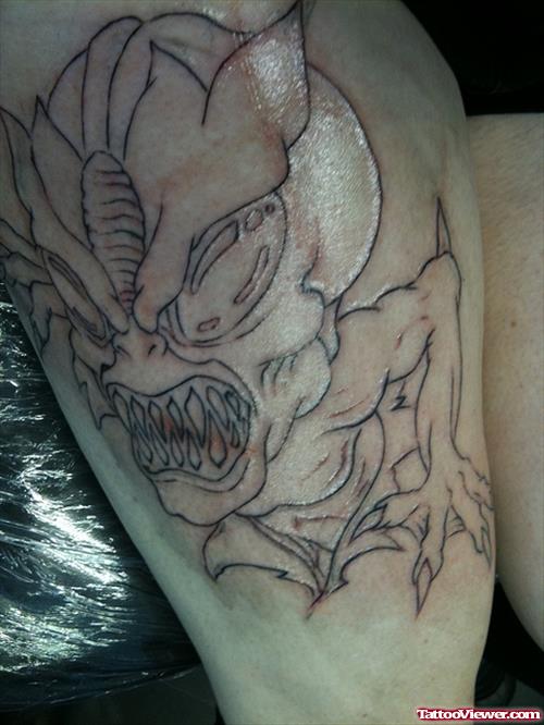 Outline Alien Tattoo On Thigh