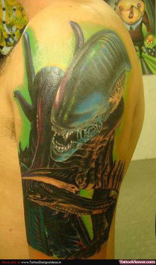 Color Ink Alien Tattoo On Left Shoulder
