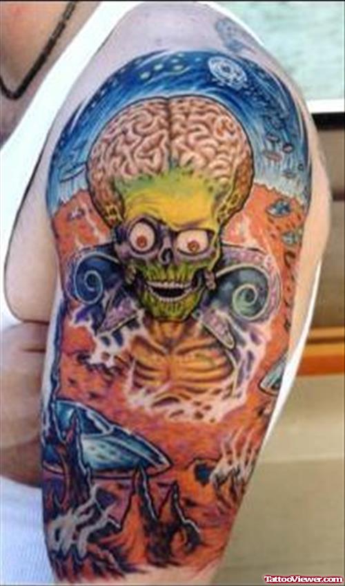 Awesome Colored Ink Alien Tattoo On Man Left Half Sleeve