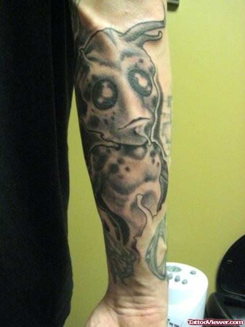 Grey Ink Alien Tattoo On Right Sleeve