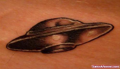 Grey Ink Alien Spaceship Tattoo