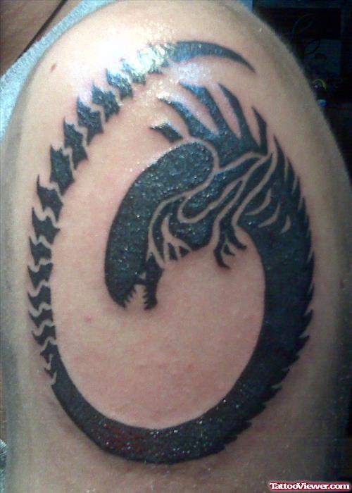 Ouroboros Alien Black Ink Tattoo On Left Shoulder