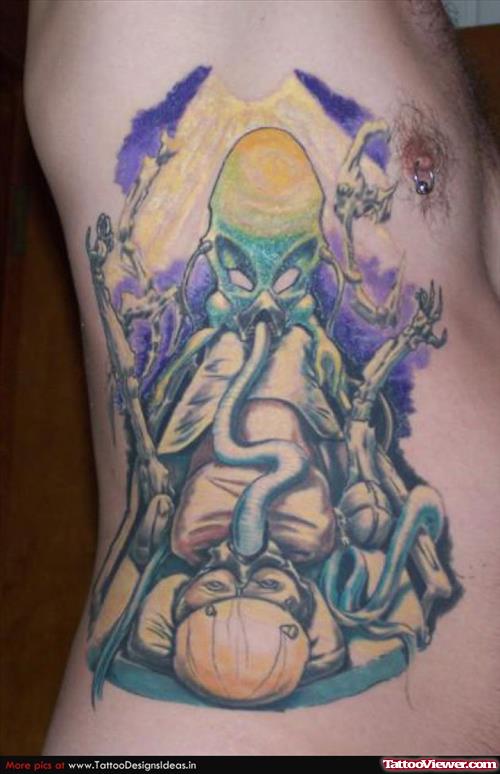 Rib Side Colored Ink Alien Tattoo For Men