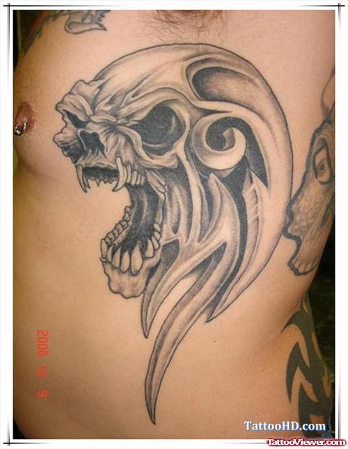 Grey Ink Alien Skull Tattoo On Side