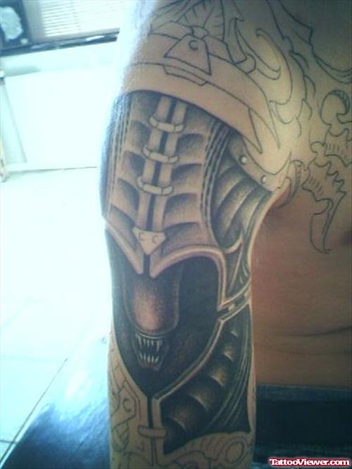 Dark Ink Alien Tattoo On Man Right Shoulder