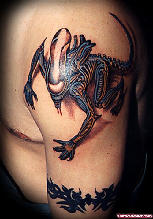 Color Ink Alien Tattoo On Man Shoulder
