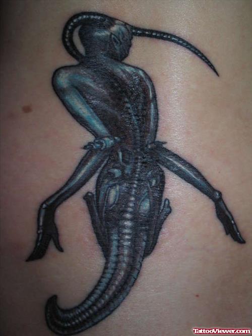 Blue Ink Alien Tattoo