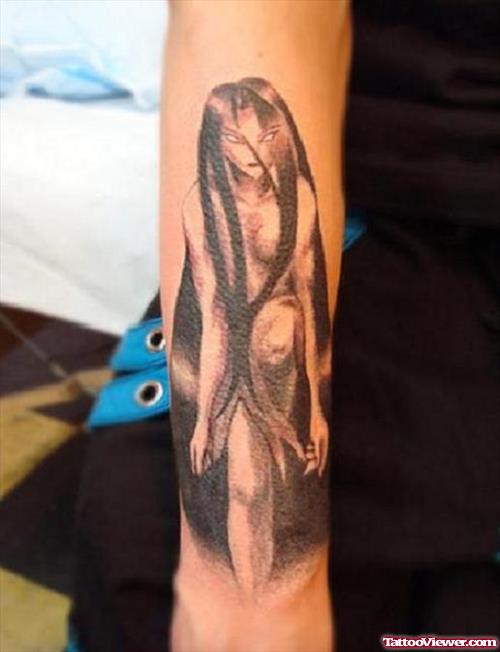 Alien Girl Tattoo On Right Arm
