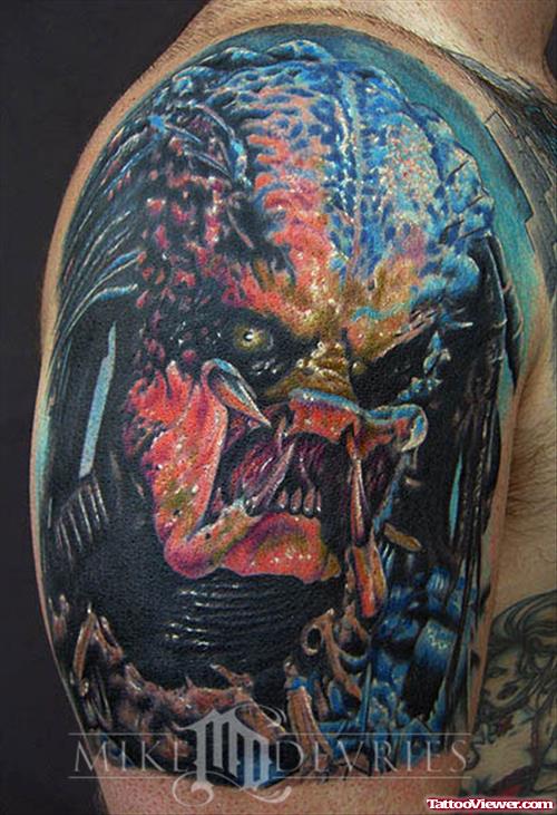 Awesome Colored Ink Alien Tattoo On Man Right Shoulder
