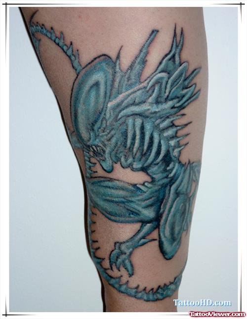 Awesome Blue Ink Alien Tattoo On Sleeve