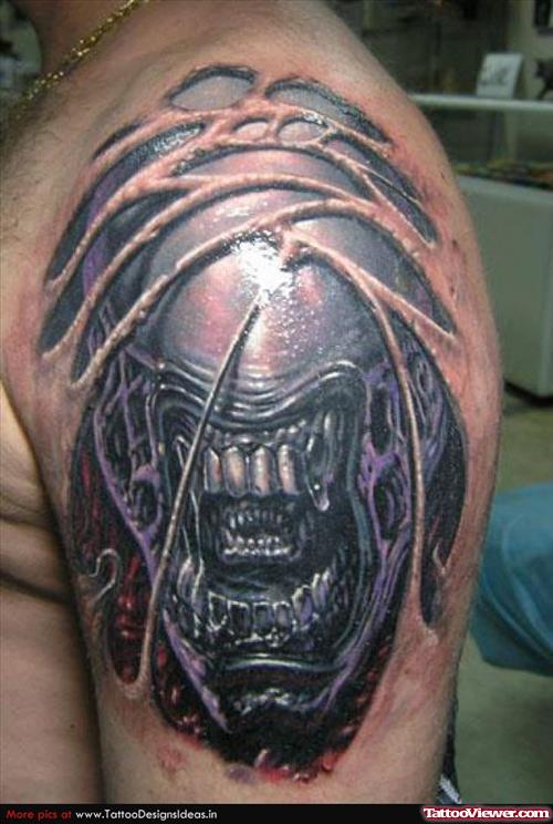 Alien Tattoo On Left SHoulder