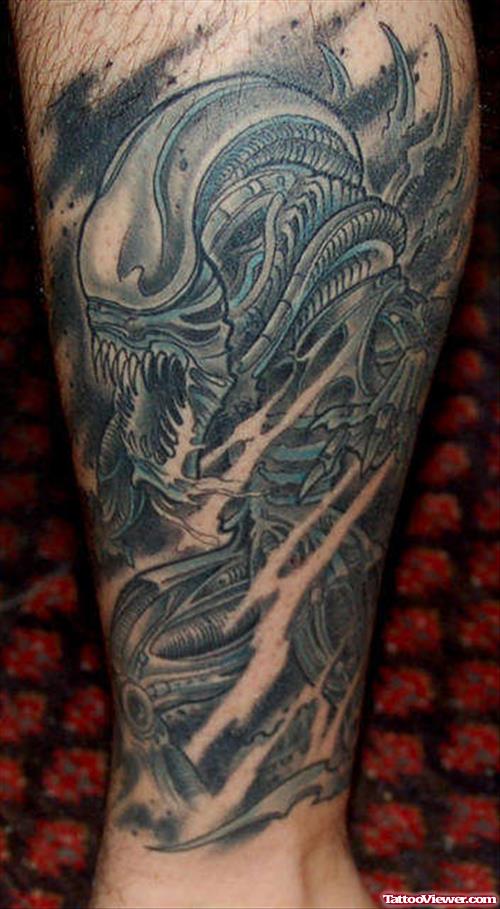 Alien Grey Ink Tattoo On Leg