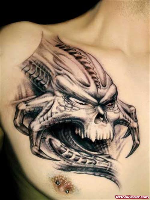 Biomechanical Alien Skull Tattoo On Man Chest