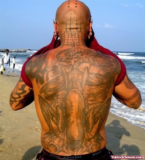 Attractive Grey Ink Alien Tattoo On Man Back Body