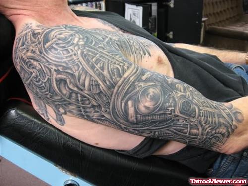 Phoenix Alien Tattoo On Arm
