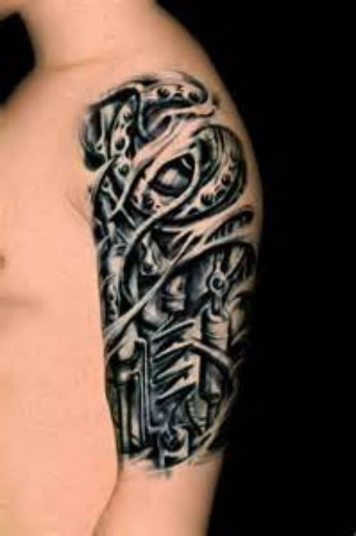 Grey Ink Alien Tattoo On Man Left Half Sleeve