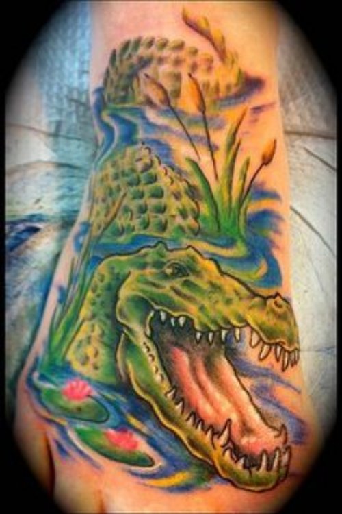 Beautiful Green Ink Alligator Tattoo On Right Foot