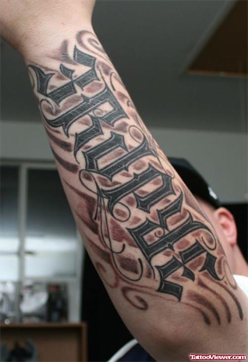 Left Arm Grey Ink Ambigram Tattoo