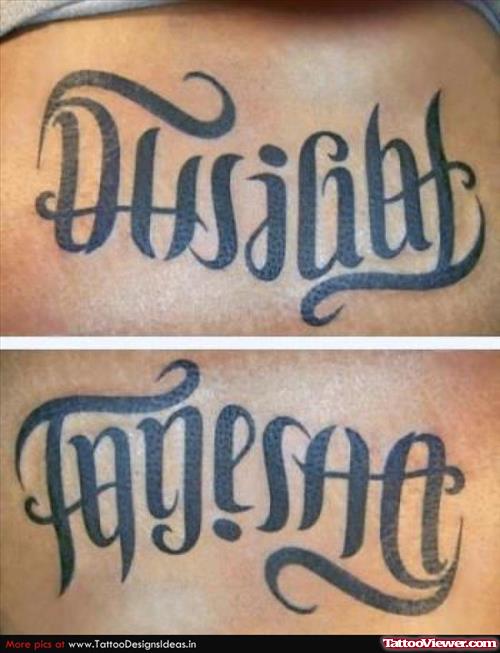Black Ink Ambigram Tattoo On Lowerback