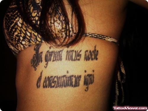 Girl Have Ambigram Tattoo On Side Rib