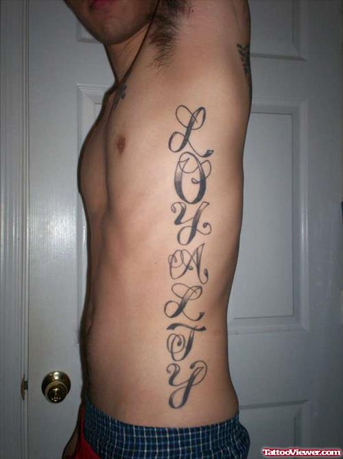 Grey Ink Loyalty Ambigram Tattoo On Side Rib