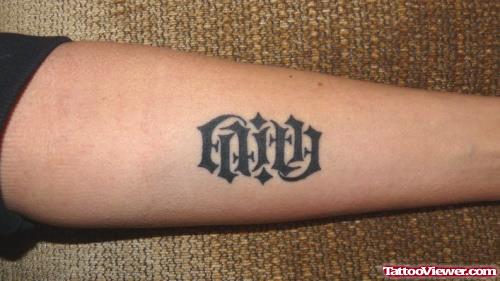 Faith Ambigram Tattoo On Arm