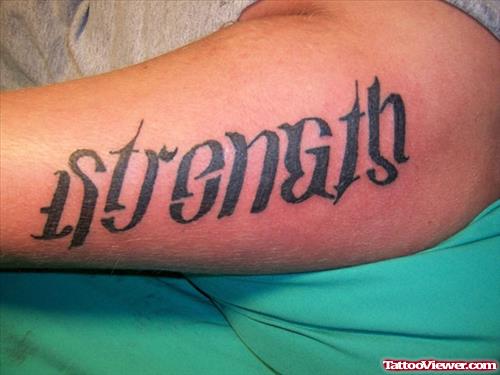 Black Ink Strength Ambigram Tattoo