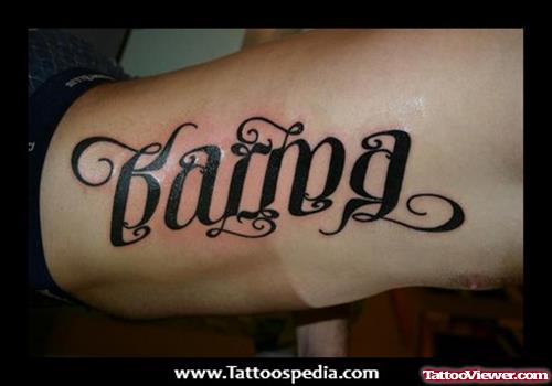 Karma Ambigram Tattoo On Side Rib