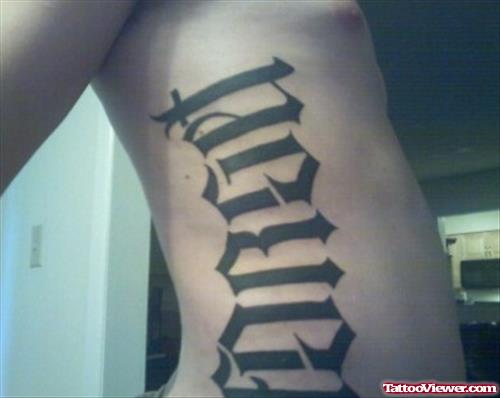 Forget Ambigram Tattoo On Side Rib